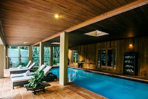 Outdoor pool, open 7:00 AM to 10:00 PM, pool loungers