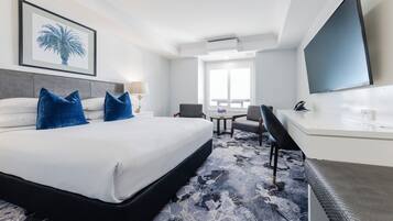 Habitación Deluxe | Escritorio, espacio para trabajar con laptop y insonorización