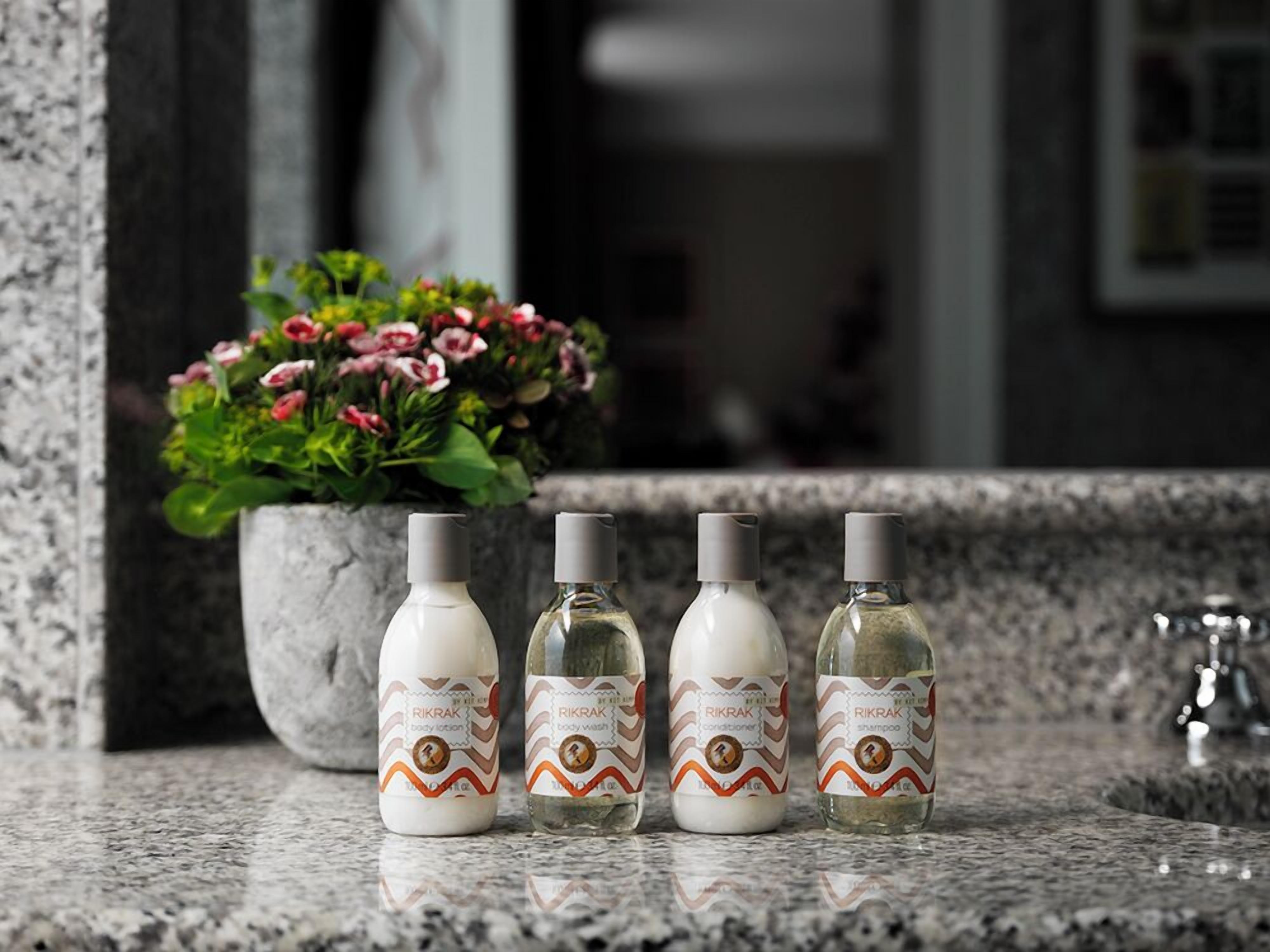 shower, designer toiletries, hair dryer, bathrobes