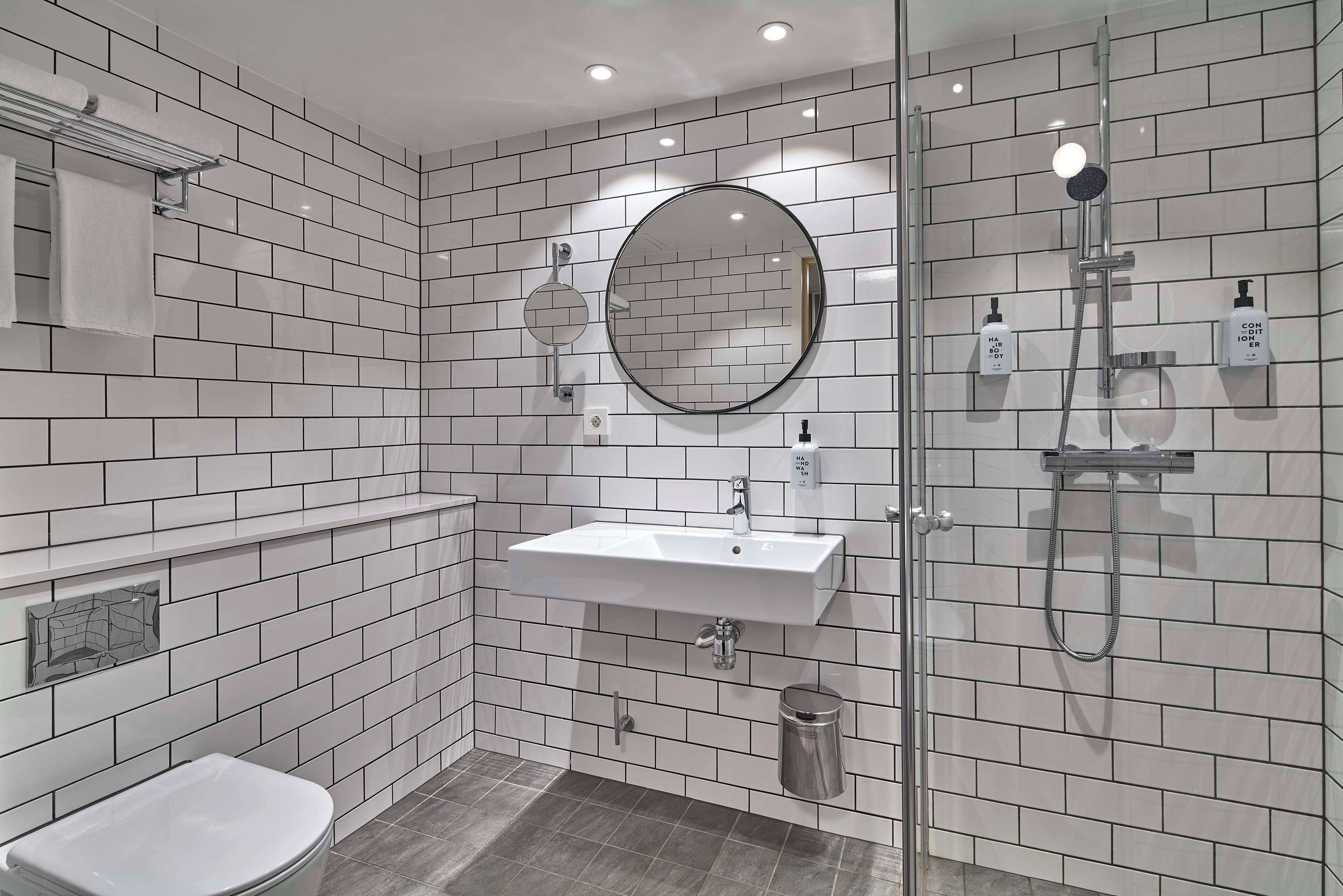 family triple room | bathroom | hair dryer, towels