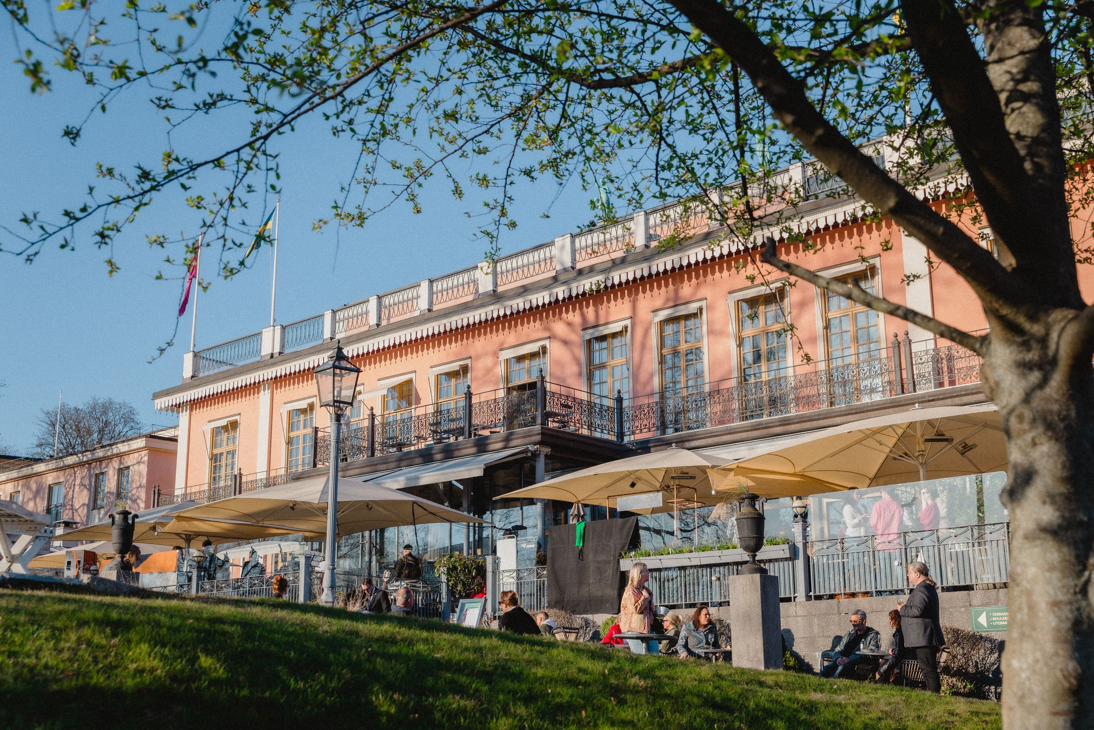 A historic building with a balcony and a covered walkway.