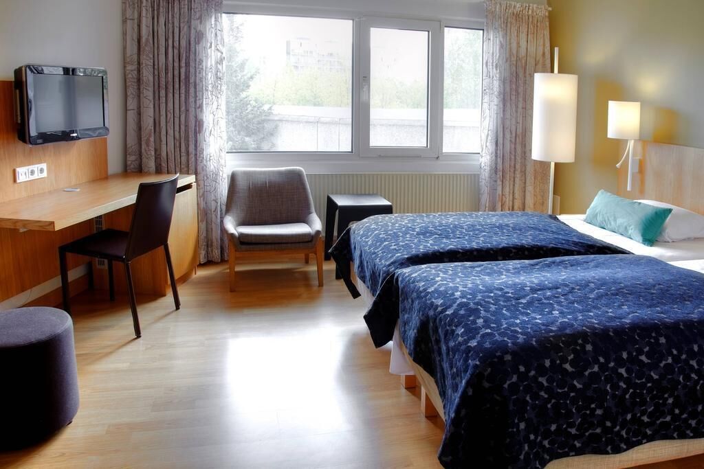 Blackout drapes, soundproofing, free WiFi, bed sheets