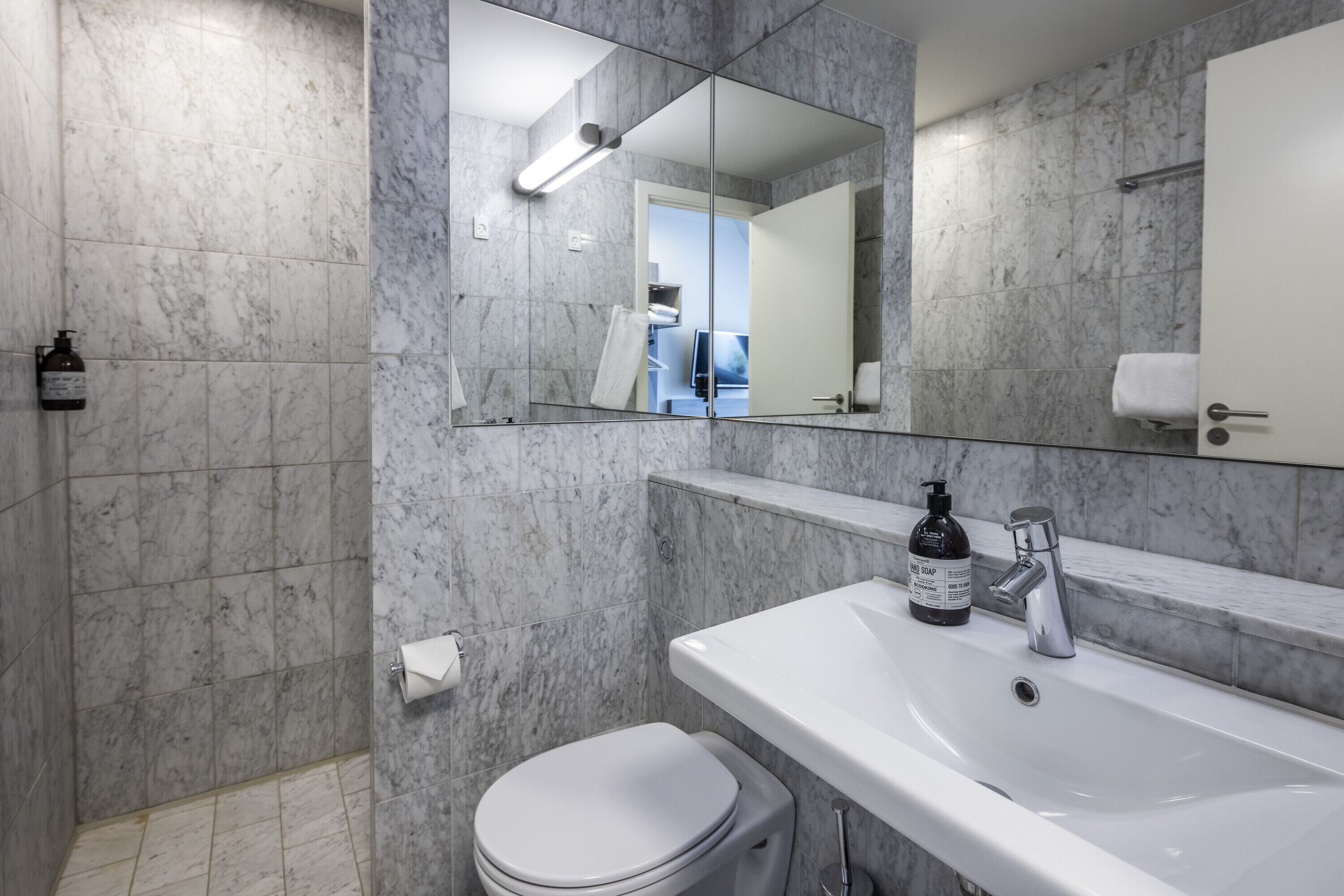 shower, eco-friendly toiletries, hair dryer, towels