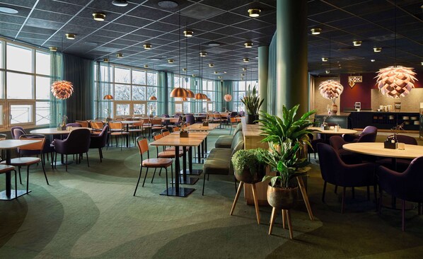 Breakfast, lunch, dinner served; local cuisine, al fresco dining 