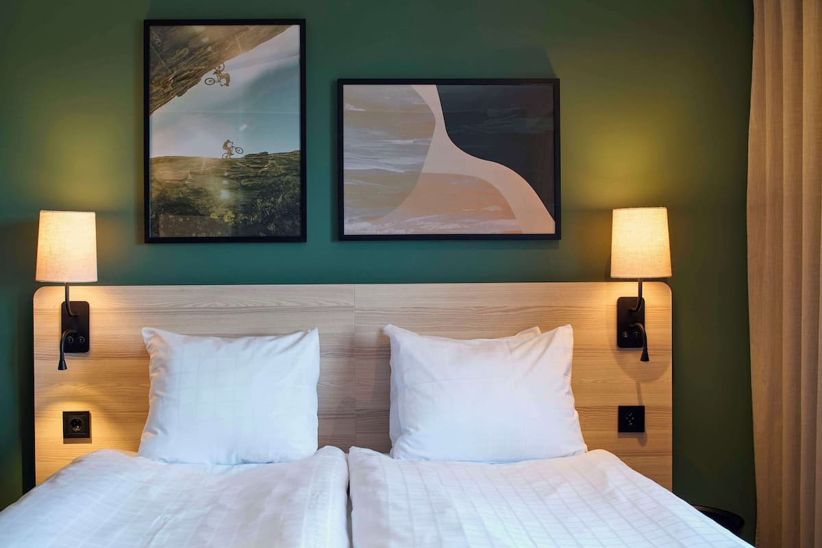 family room (standard - four) | 1 bedroom, desk, laptop workspace, blackout curtains