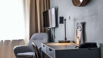 Iron/ironing board, travel crib, free WiFi, bed sheets