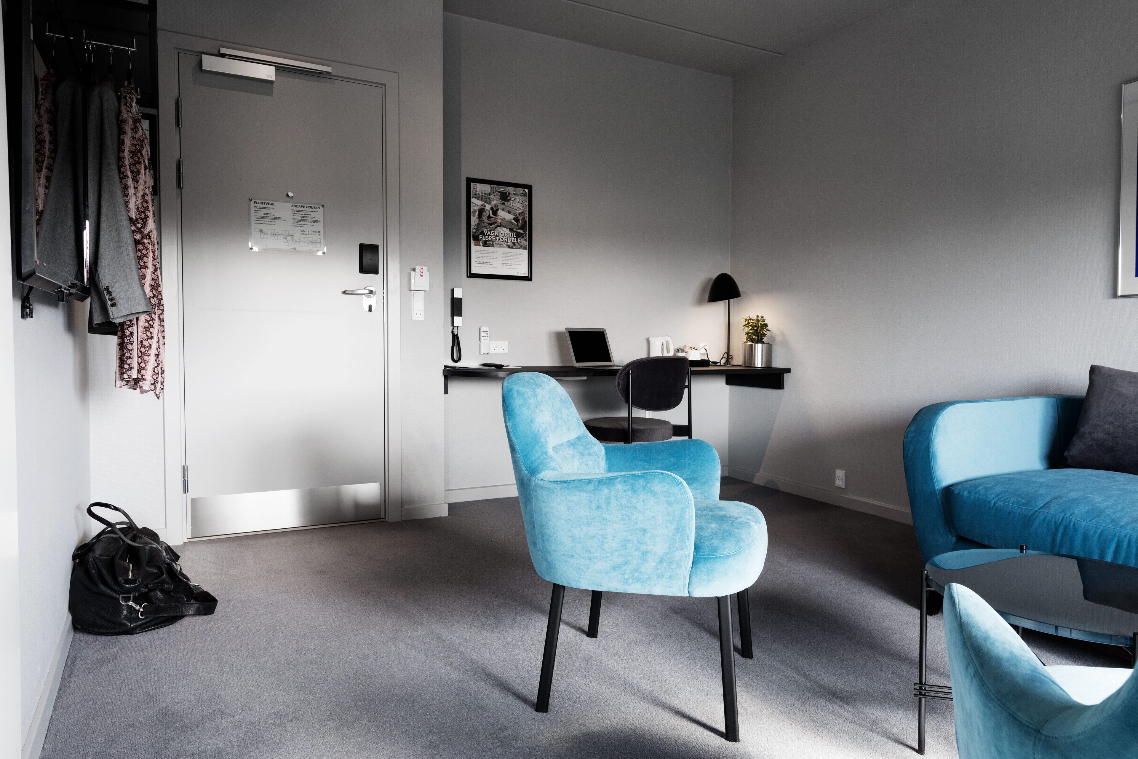 junior suite | in-room safe, desk, laptop workspace, iron/ironing board