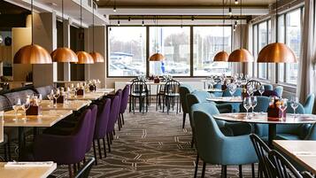 Breakfast, lunch, dinner served; local cuisine