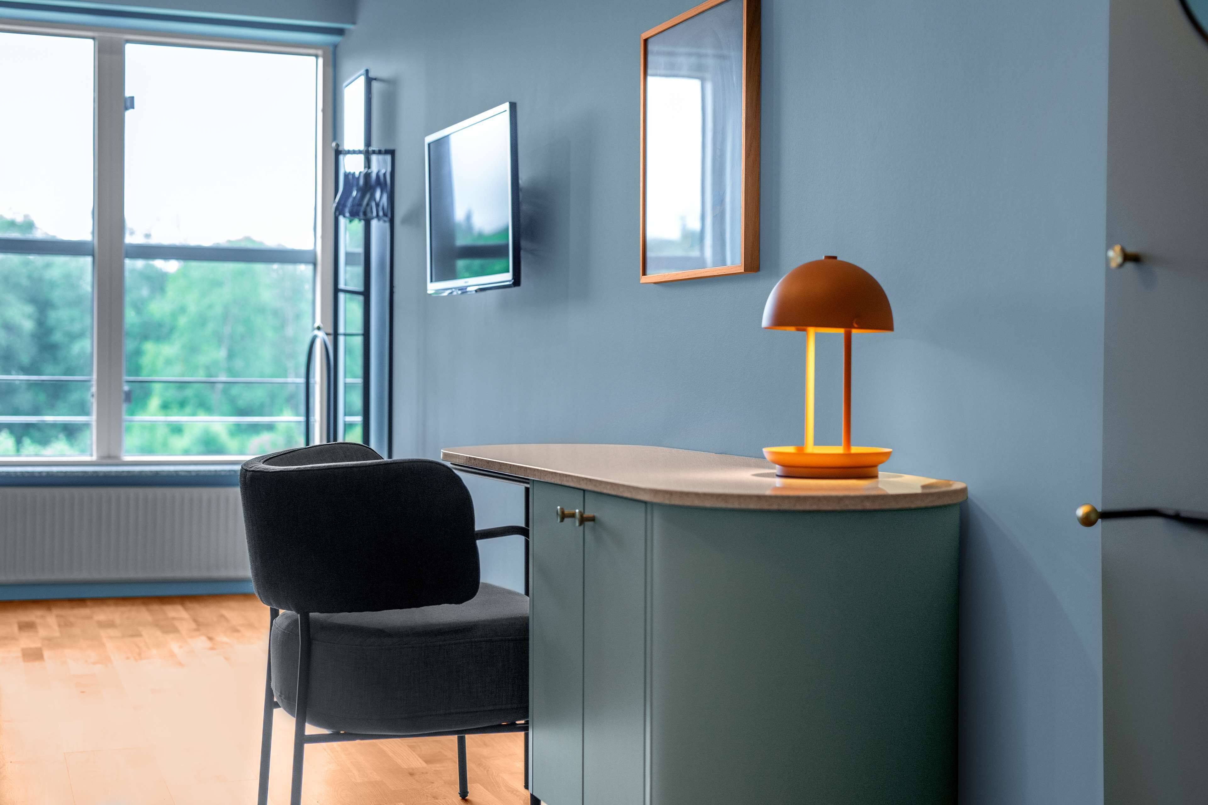 family room | 1 bedroom, in-room safe, desk, laptop workspace