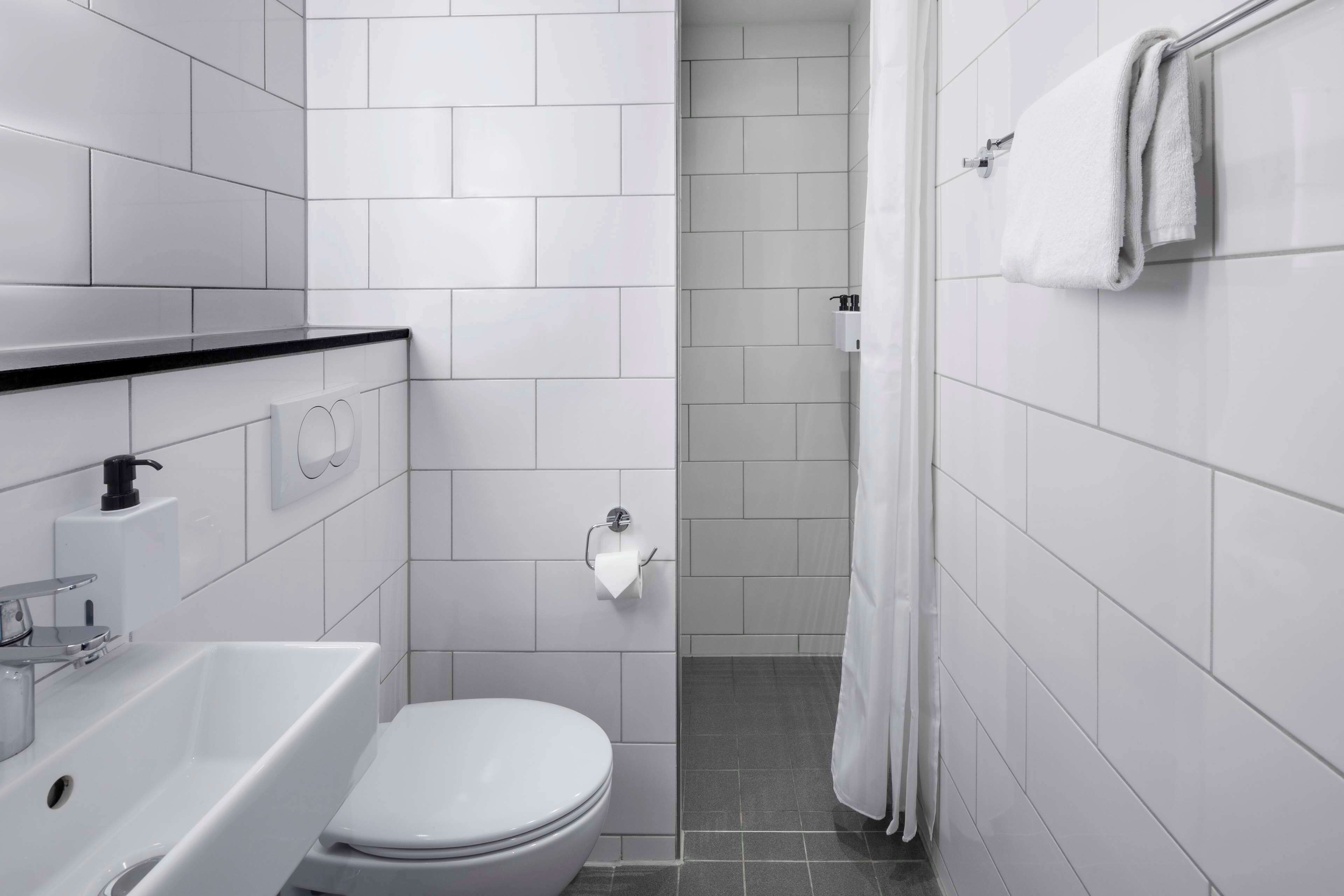 eco-friendly toiletries, hair dryer, towels, soap