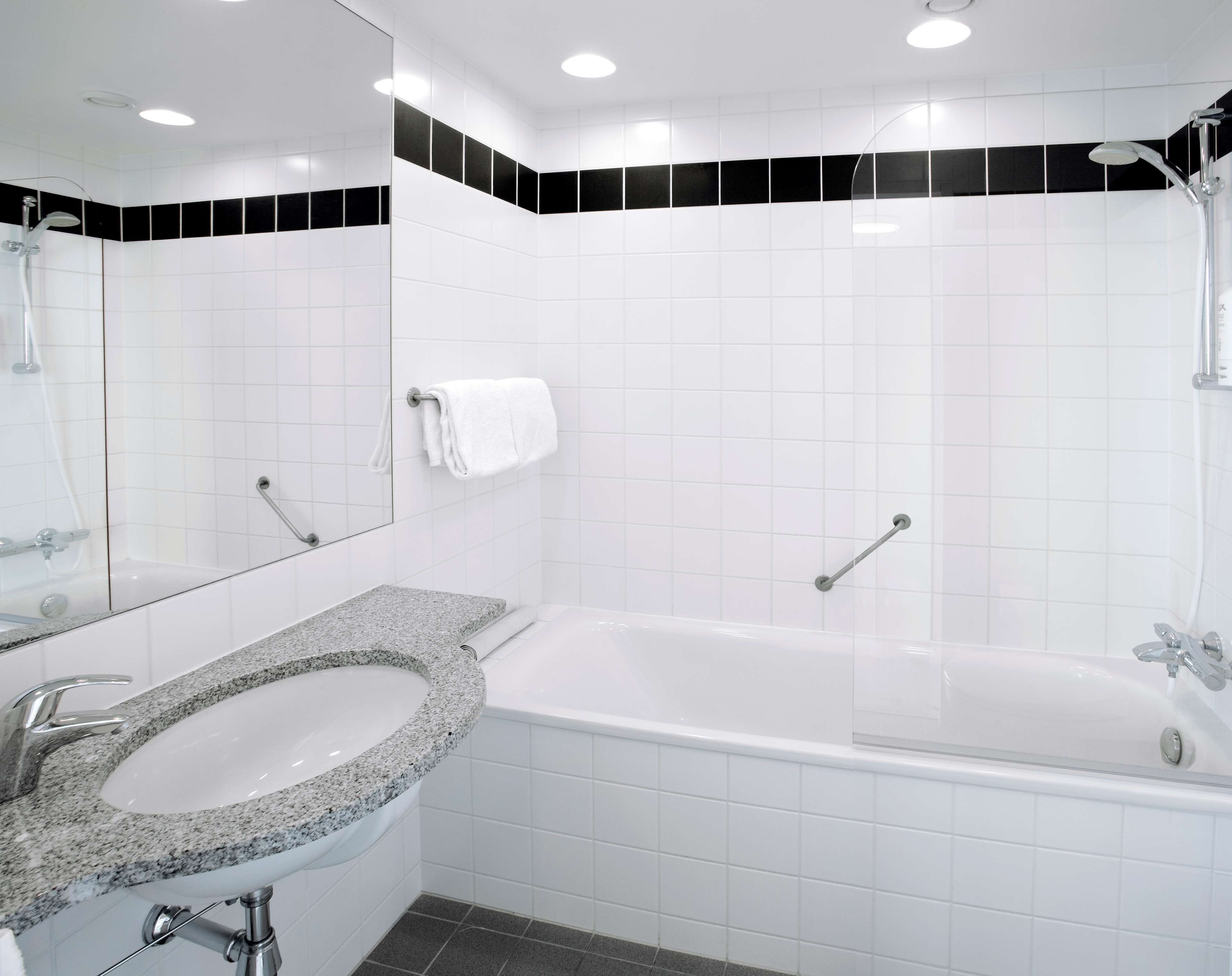 junior suite | bathroom | eco-friendly toiletries, hair dryer, towels, soap