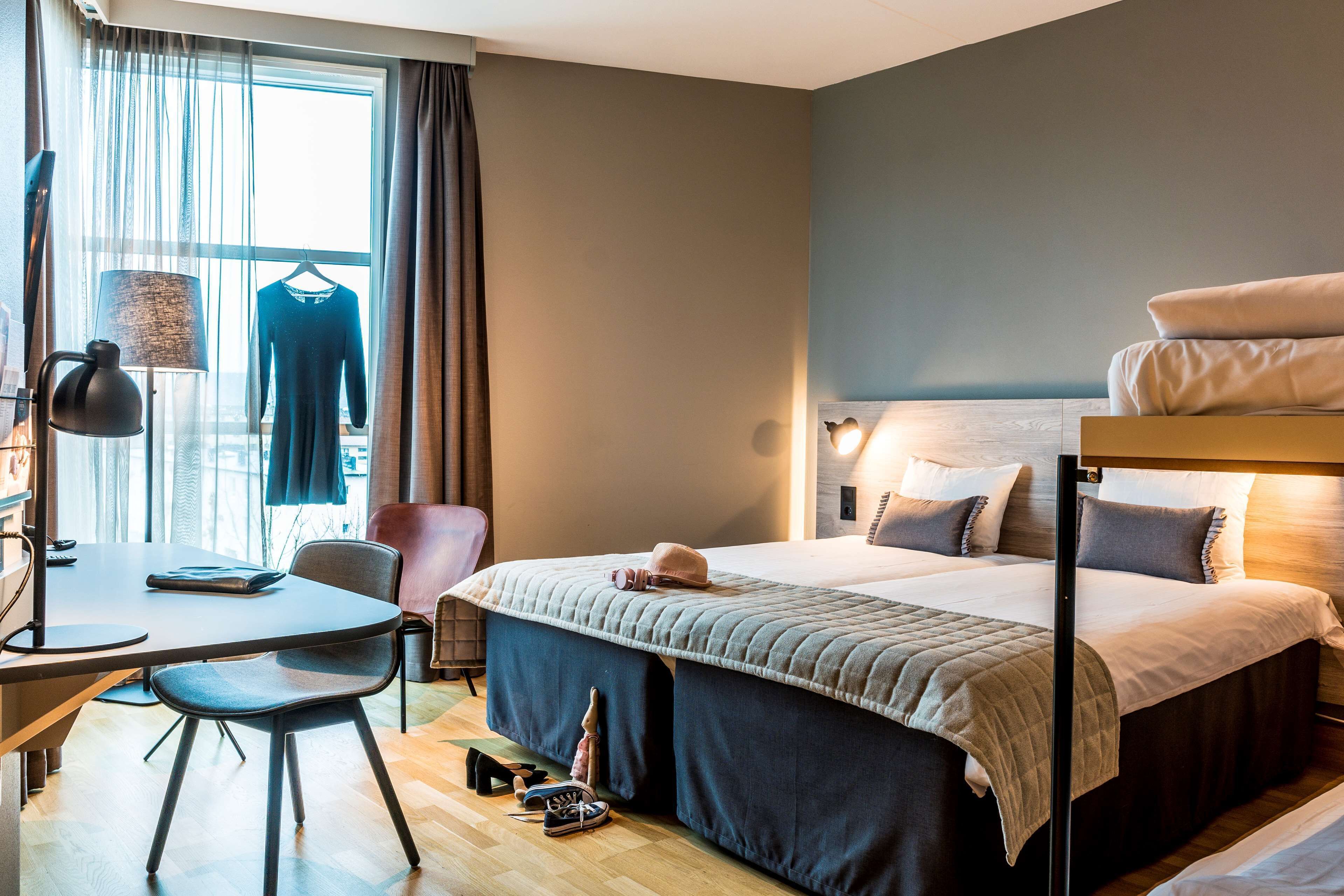 family room | desk, soundproofing, iron/ironing board, free cots/infant beds