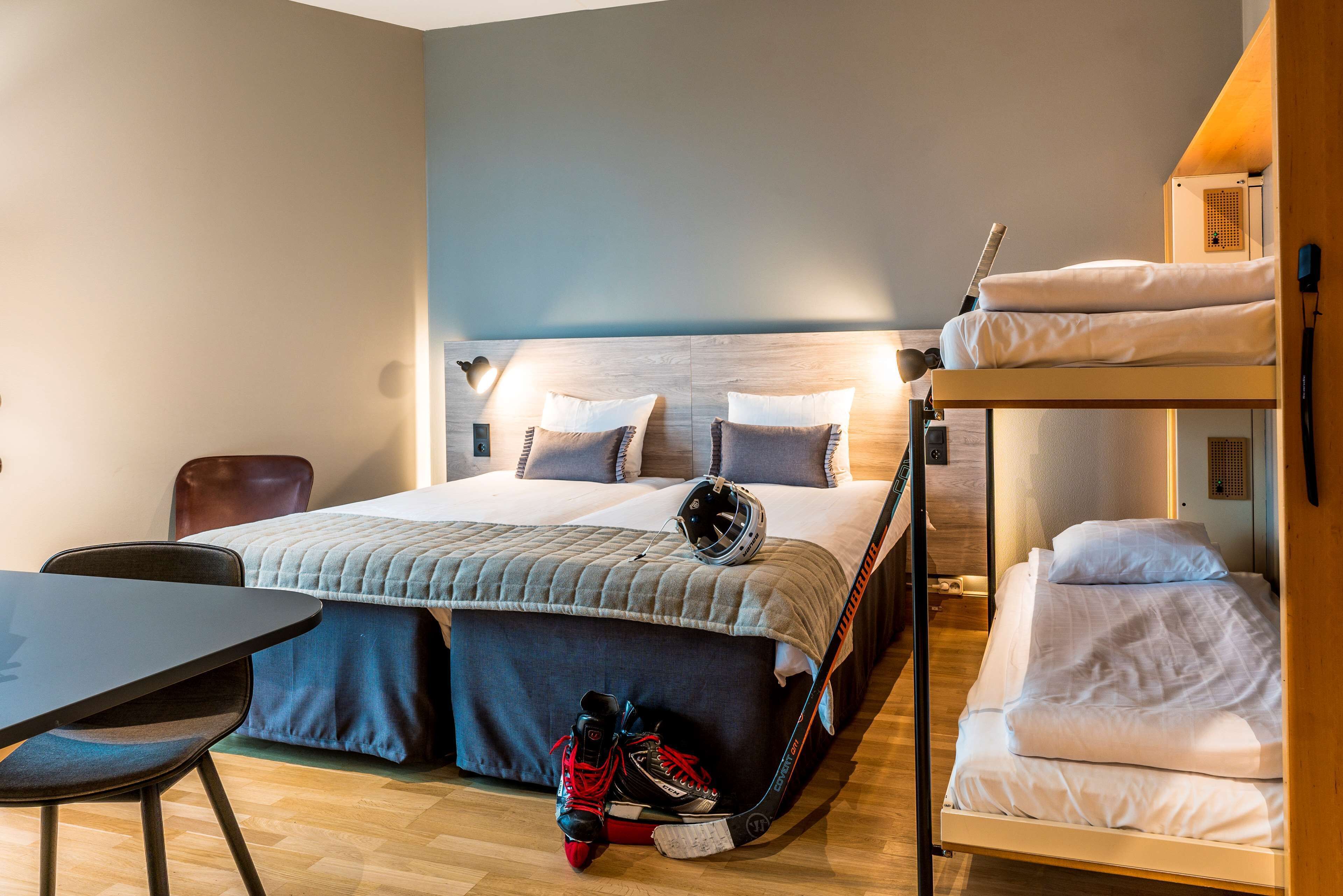 family room | desk, soundproofing, iron/ironing board, free cots/infant beds