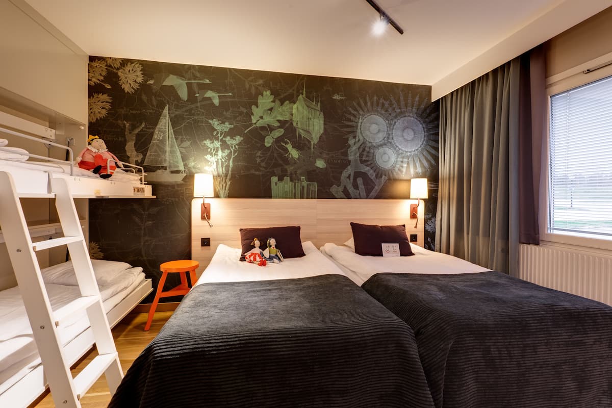 family room (four) | desk, blackout curtains, iron/ironing board, free cots/infant beds