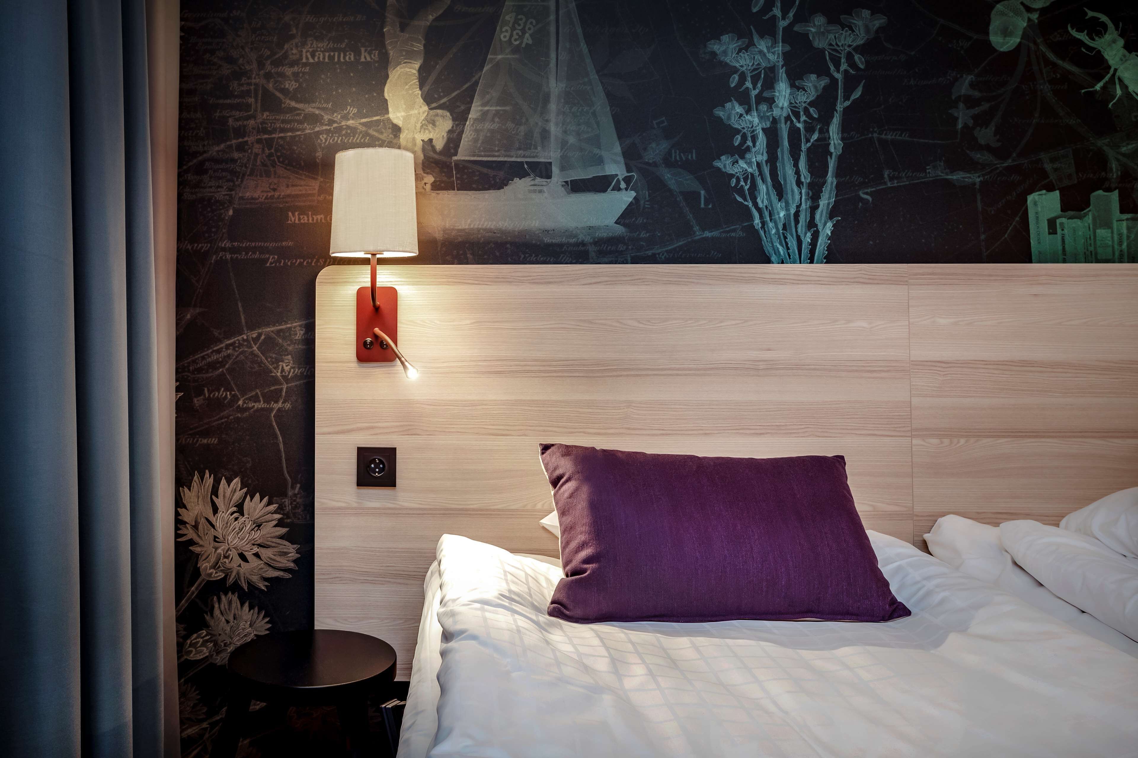 desk, blackout curtains, iron/ironing board, free cots/infant beds