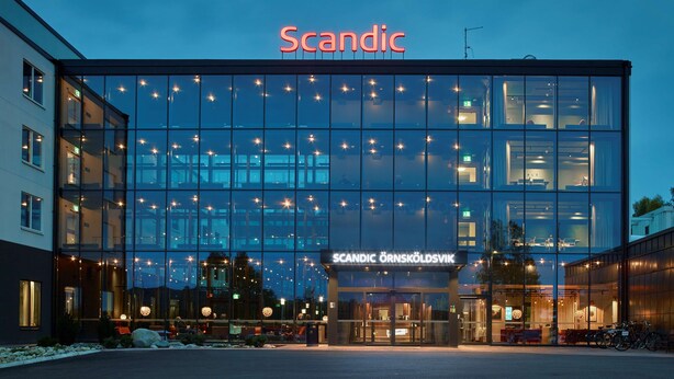 A modern building with a glass facade and the name "Scandic" prominently displayed. - Scandic Örnsköldsvik (Ornskoldsvik)