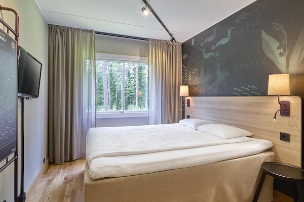 Desk, blackout curtains, iron/ironing board, free cots/infant beds