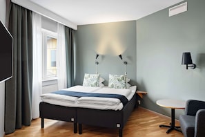 Standard Room, 1 Queen Bed, Non Smoking | Pillow-top beds, individually decorated, desk, laptop workspace