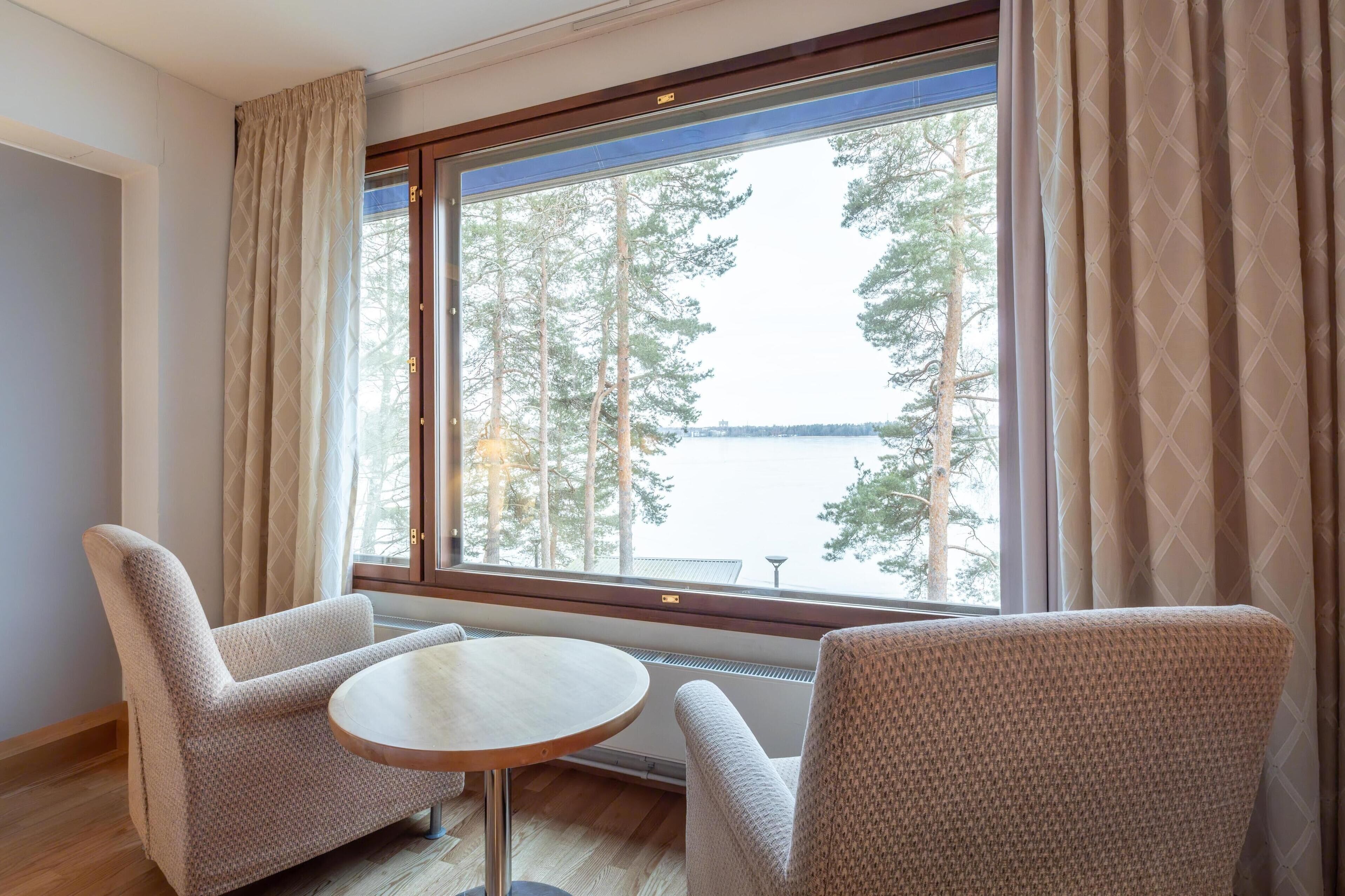 twin deluxe room | living area | tv