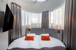 Minibar, bureau, rideaux occultants, chambres insonorisées