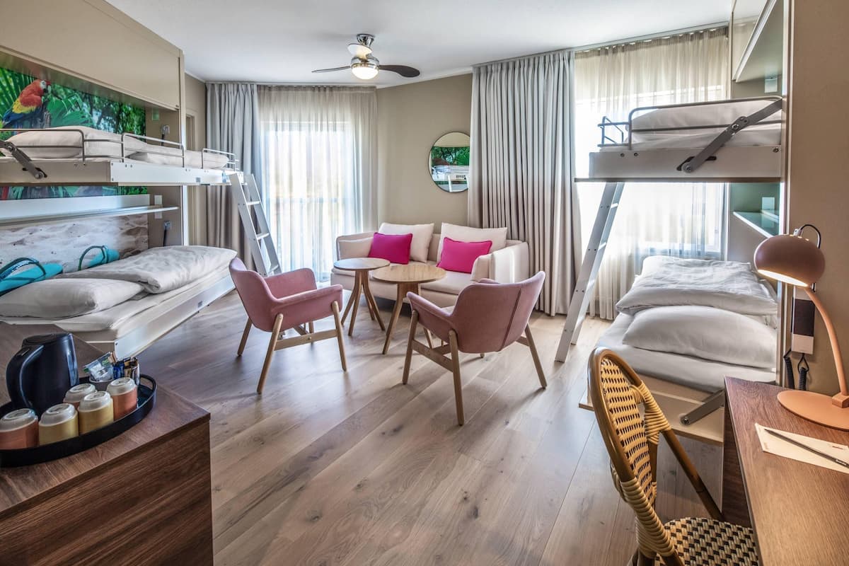 junior suite | in-room safe, blackout curtains, iron/ironing board, cots/infant beds