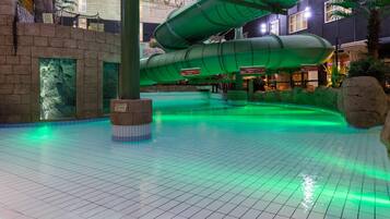 Indoor pool, outdoor pool, pool umbrellas, pool loungers
