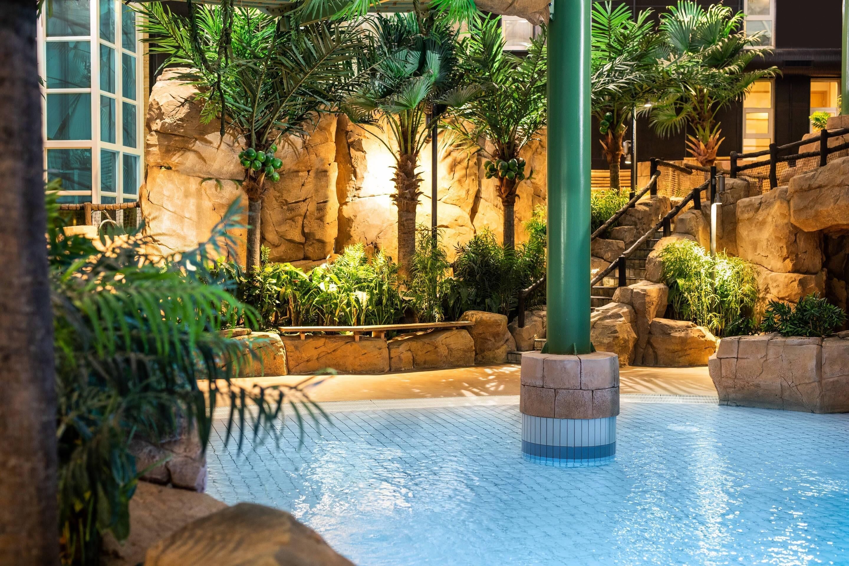 indoor pool, outdoor pool, pool umbrellas, pool loungers