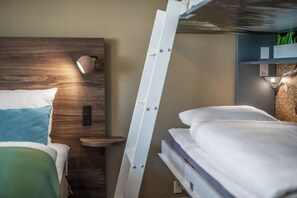 In-room safe, blackout curtains, iron/ironing board, cots/infant beds