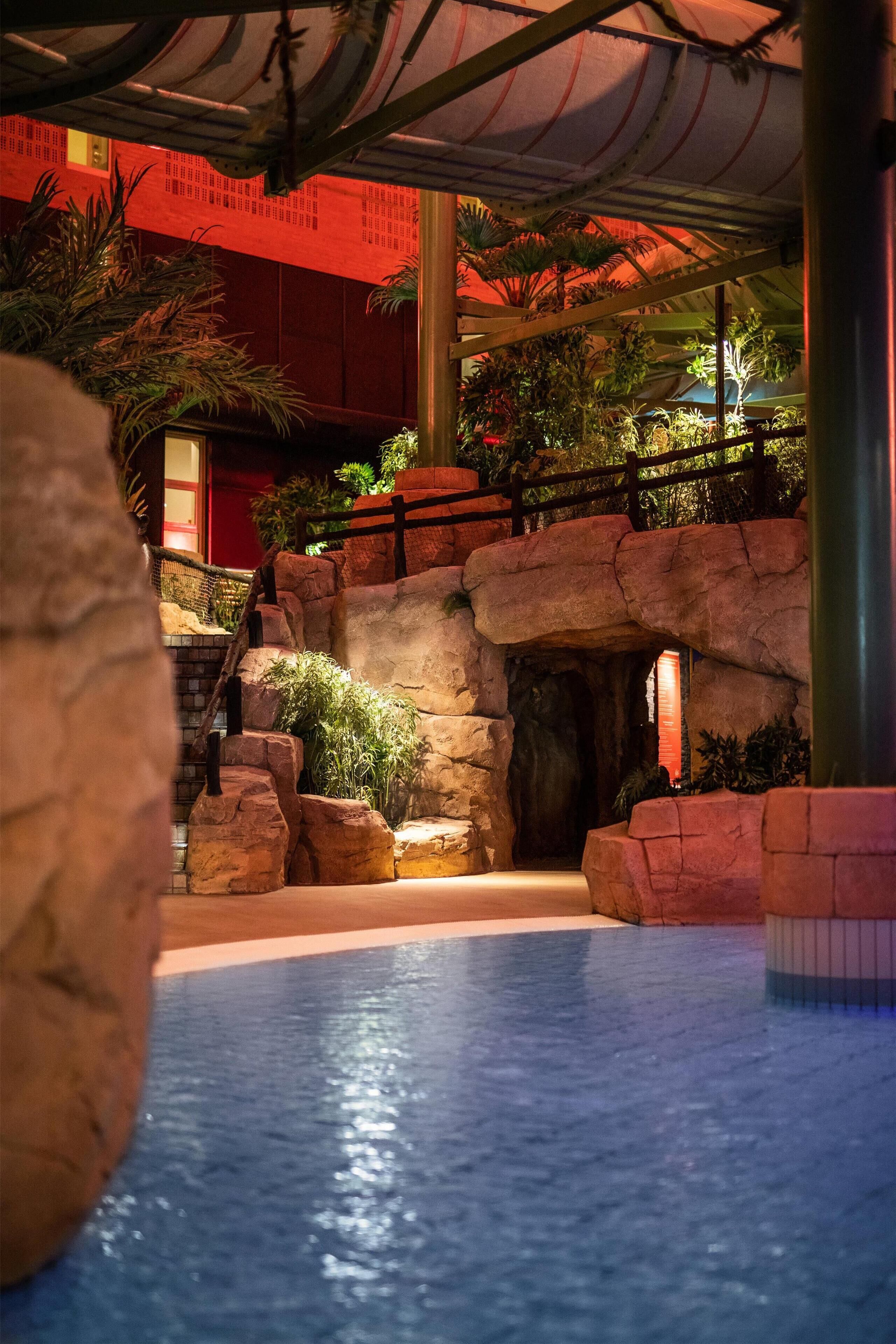 indoor pool, outdoor pool, pool umbrellas, pool loungers