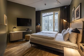 Habitación (King Plus) | Caja de seguridad en la habitación y ropa de cama