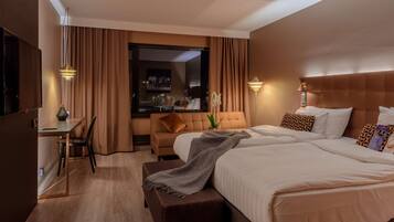 Premium bedding, memory-foam beds, in-room safe, desk
