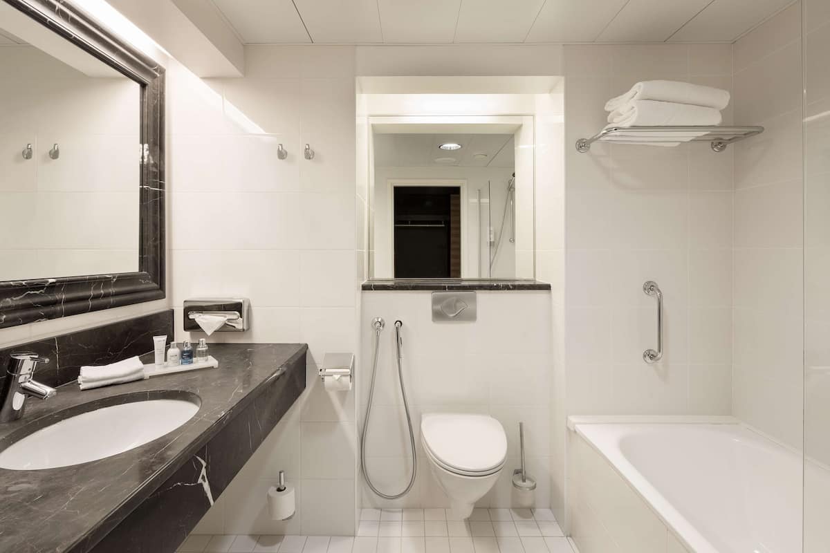 shower, eco-friendly toiletries, hair dryer, towels