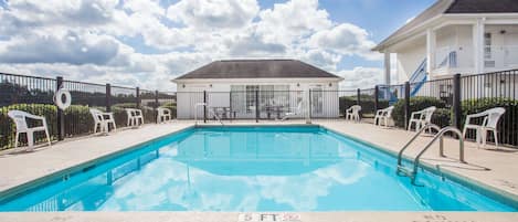Seasonal outdoor pool, open 10:00 AM to 9:00 PM, pool umbrellas