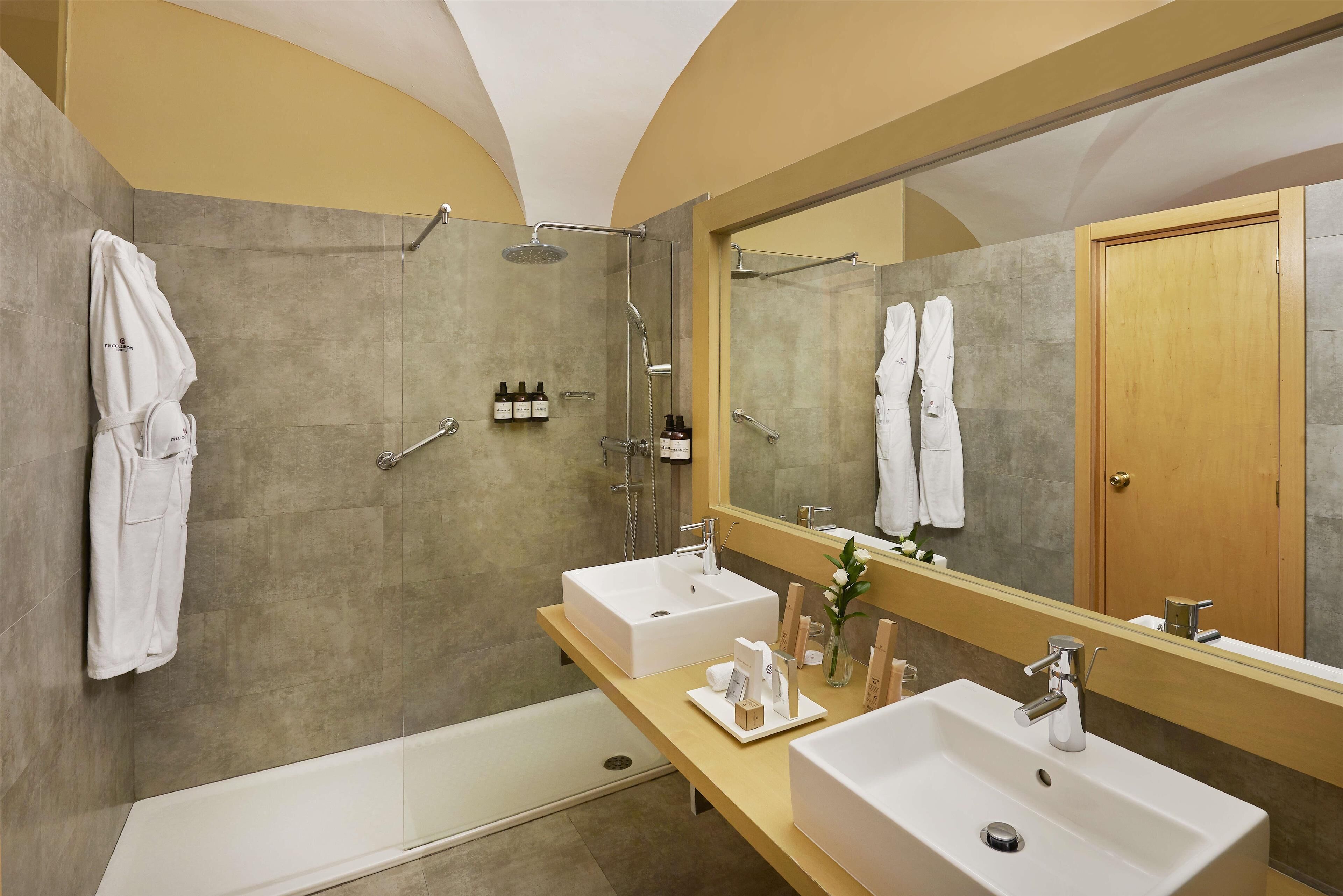 eco-friendly toiletries, hair dryer, bathrobes, towels