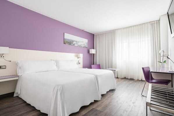 Down duvets, minibar, in-room safe, desk