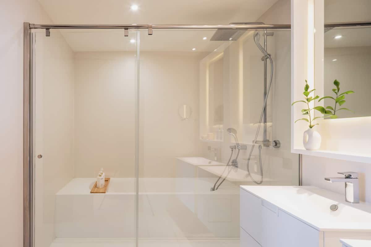presidential suite red level | bathroom | designer toiletries, hair dryer, bathrobes, slippers