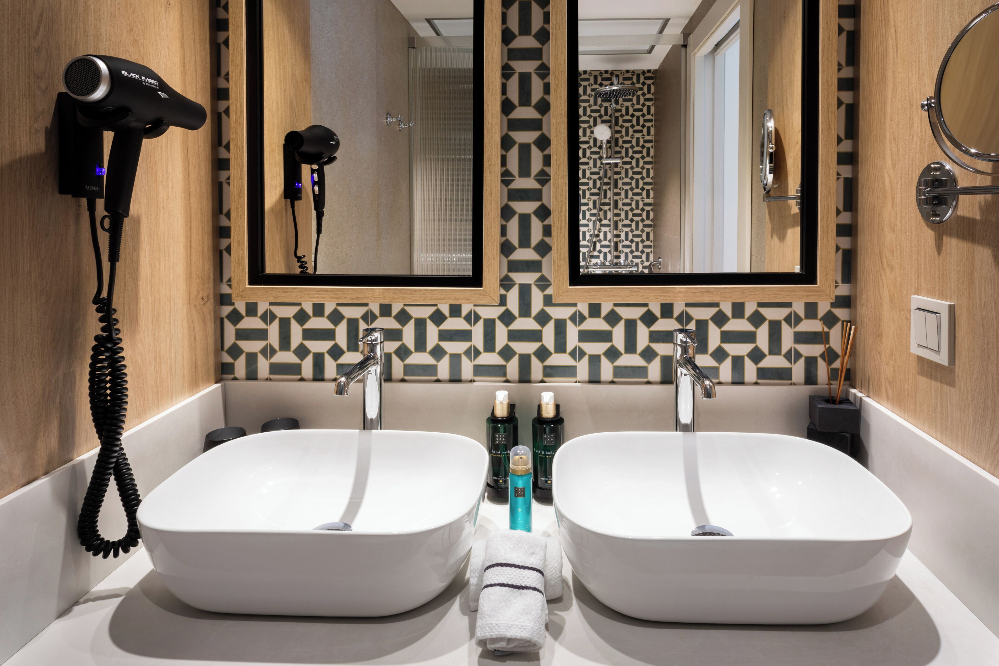 Shower, rainfall showerhead, designer toiletries, hair dryer