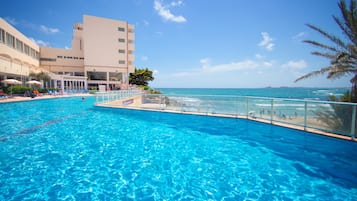 Outdoor pool, pool umbrellas, sun loungers
