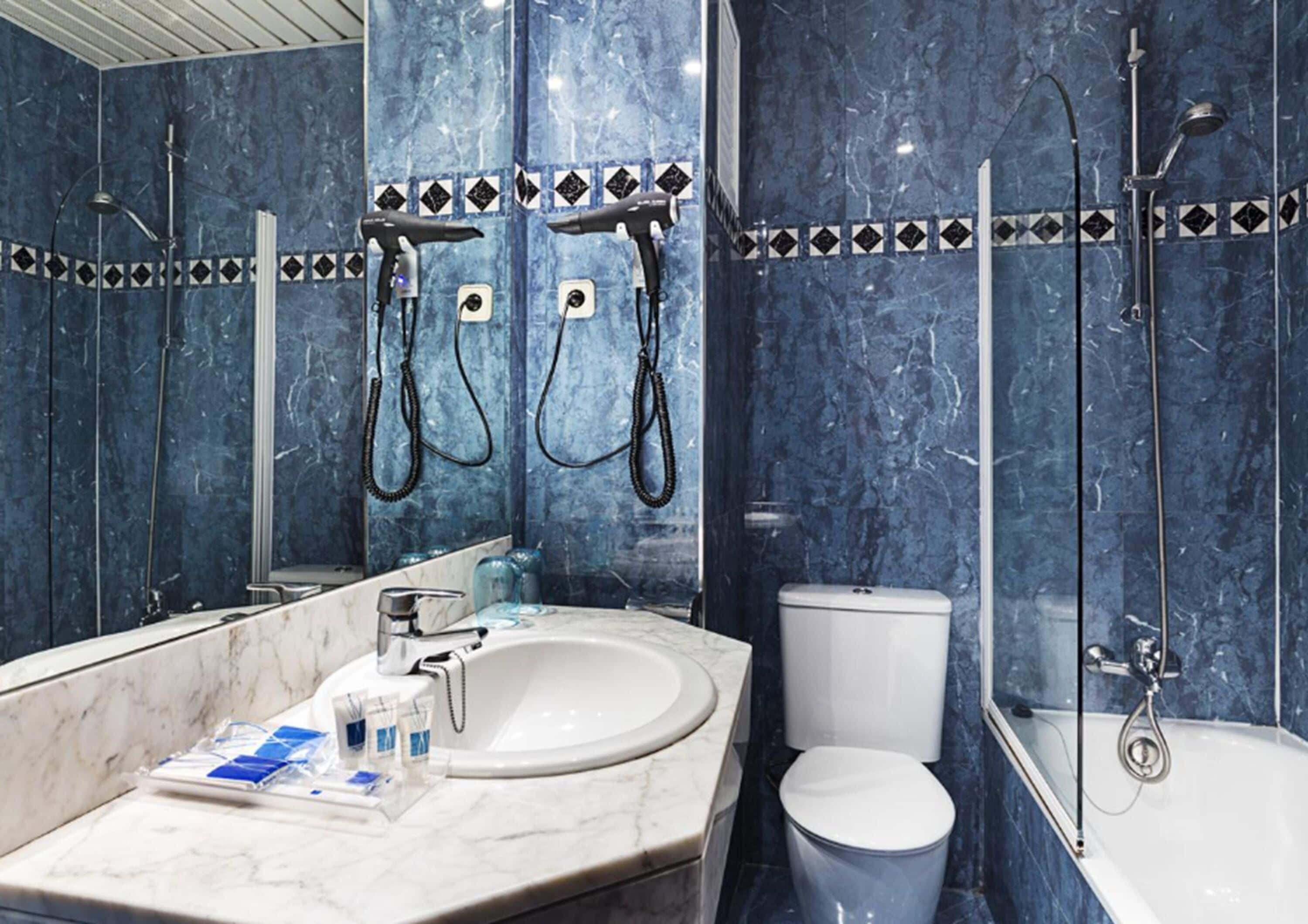 eco-friendly toiletries, hair dryer, towels