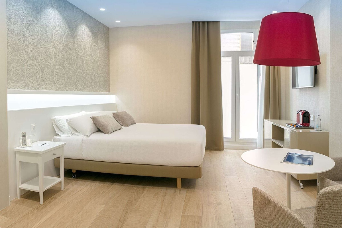 Down duvets, minibar, in-room safe, desk