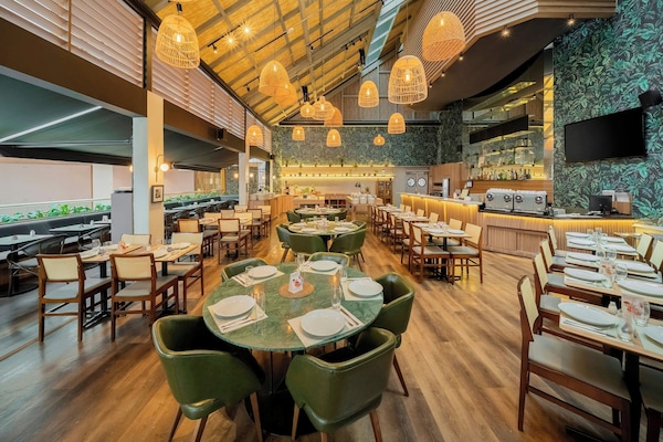 Breakfast, lunch, dinner served; international cuisine