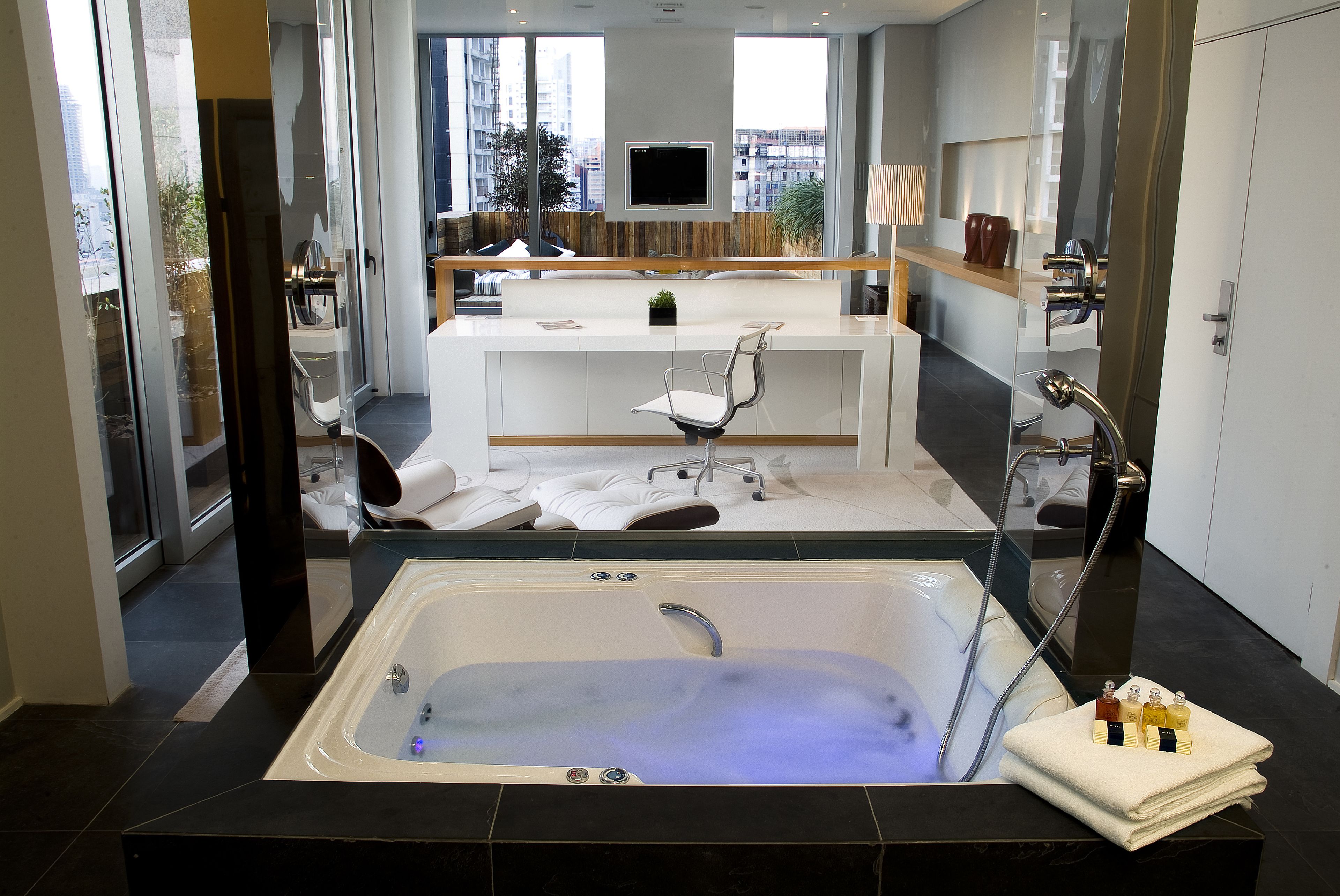 designer toiletries, hair dryer, bathrobes, towels