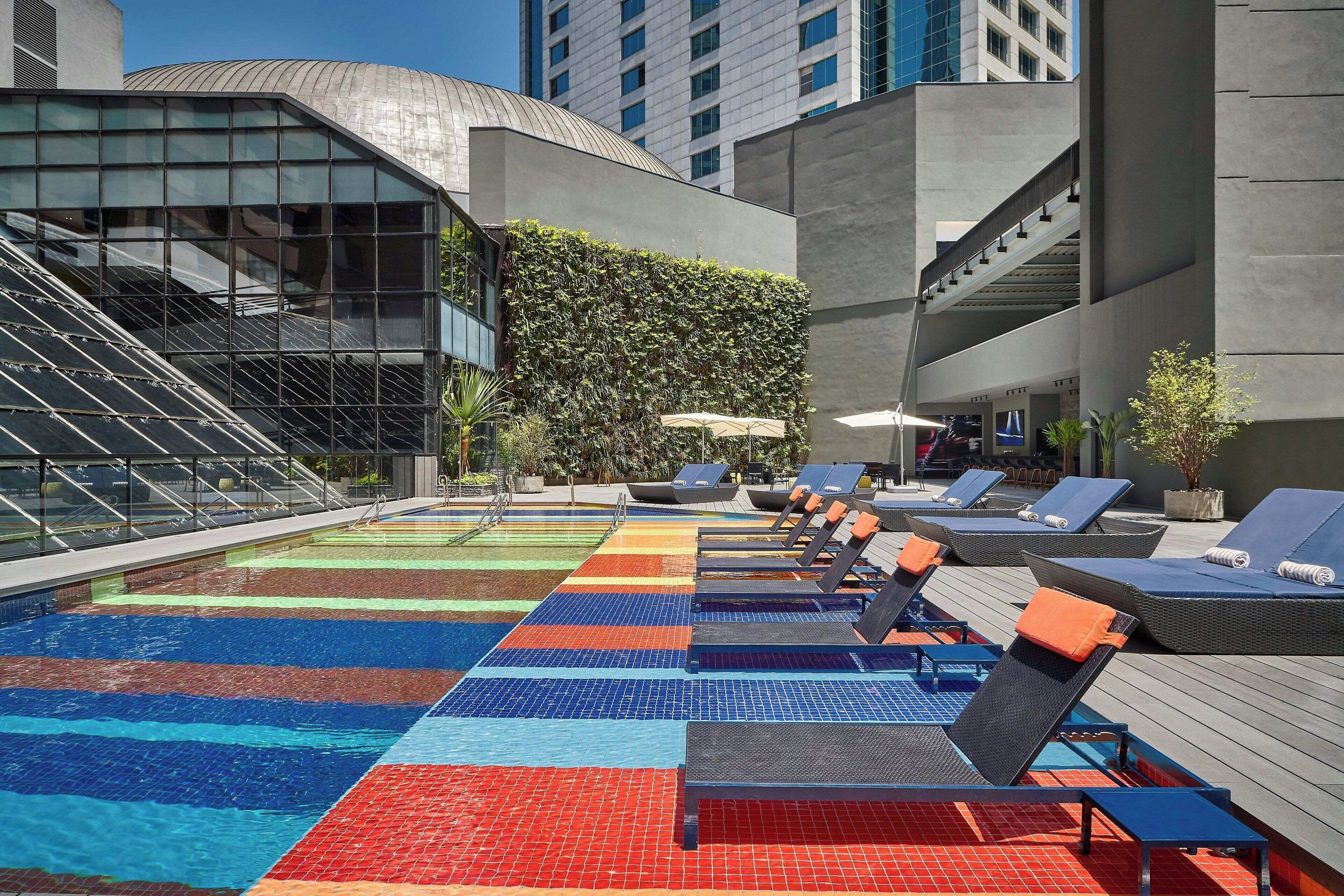 Outdoor pool, open 8:00 AM to 6:00 PM, pool loungers