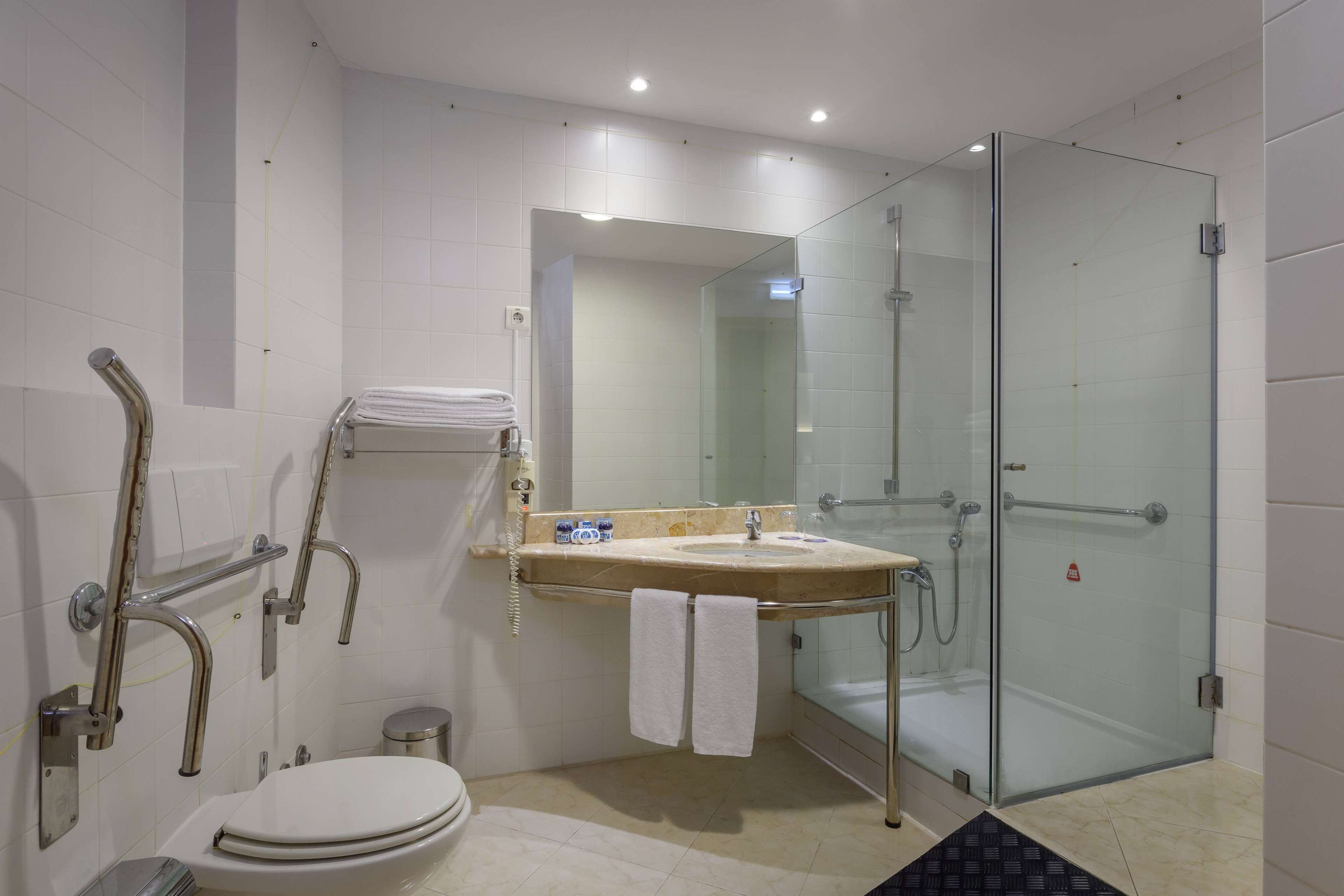 room, 3 single beds, accessible, non smoking (mobility) | minibar, in-room safe, desk, laptop workspace