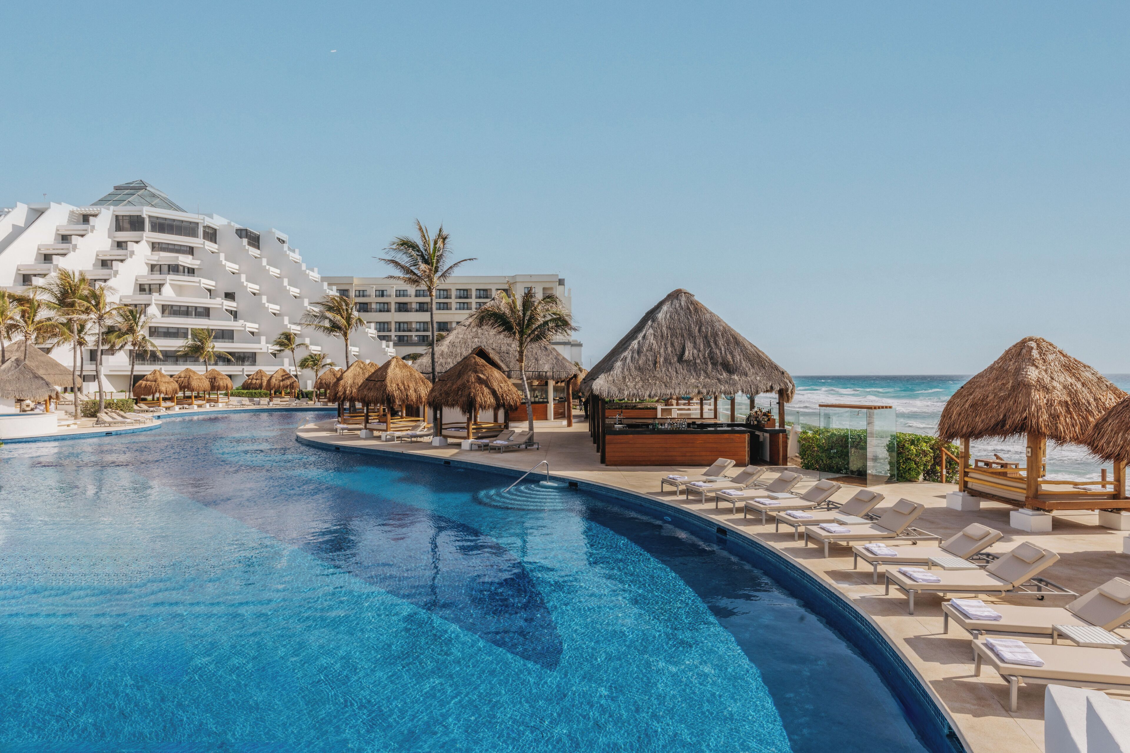 4 outdoor pools, cabanas (surcharge), pool umbrellas