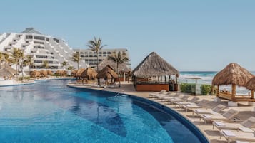 4 outdoor pools, cabanas (surcharge), pool umbrellas