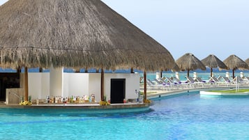 4 outdoor pools, cabanas (surcharge), pool umbrellas