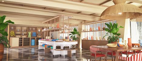A spacious lobby with a central island, seating area, and a large woven light fixture.