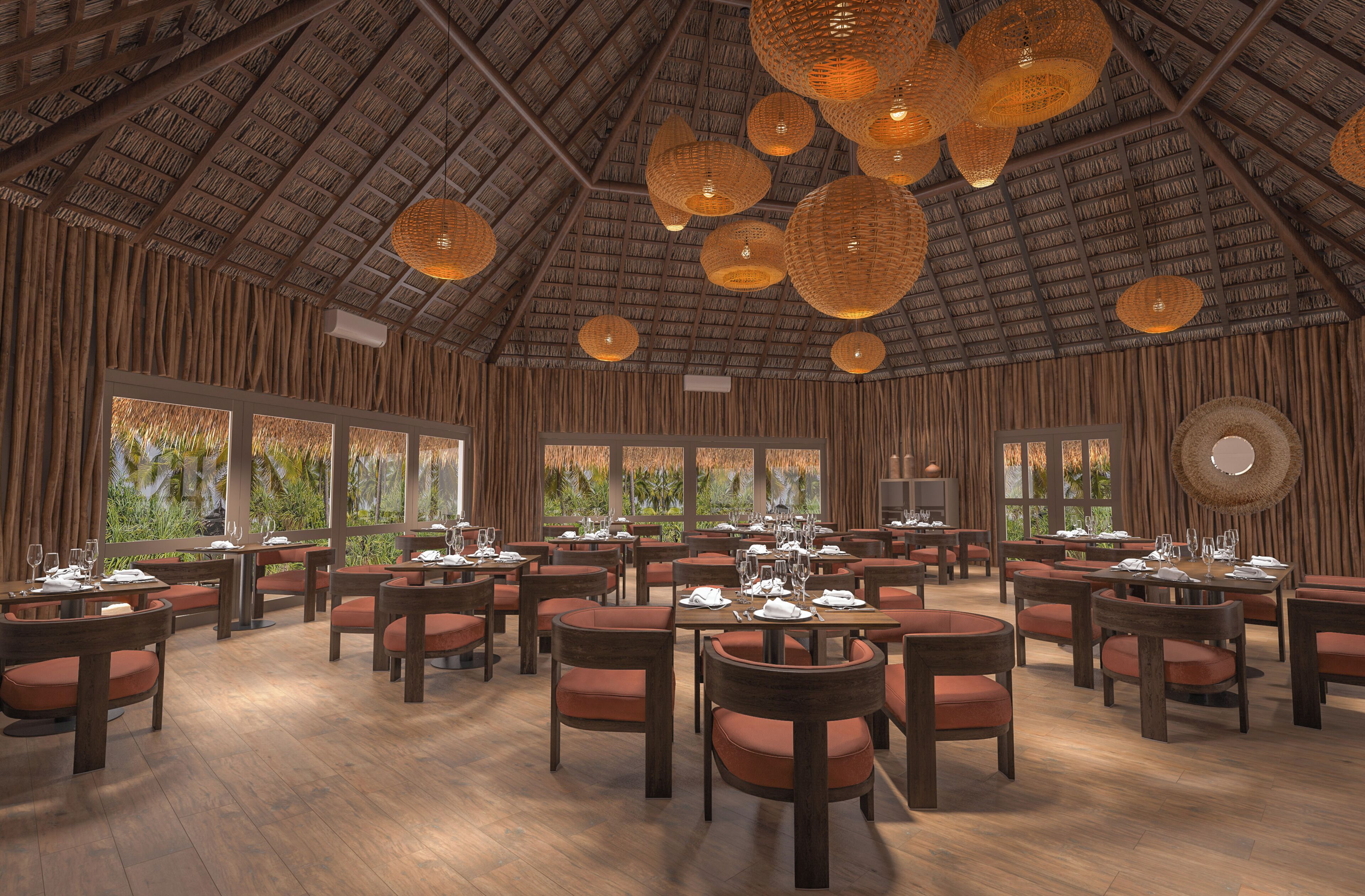 A spacious indoor dining area with multiple tables and chairs, large windows offering views of greenery, and a high ceiling with woven light fixtures.