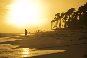 Private beach, beach umbrellas, beach massages, windsurfing